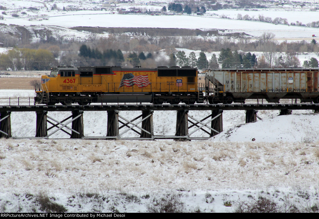 UP SD70M #4367 leads the northbound Cache Valley Local (LCG-41C) on the "Presto Trestle" at Presto Products in Lewiston, Utah April 13, 2022